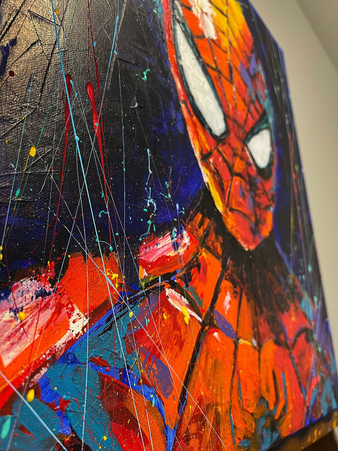 Vibrant Spider-Verse: Abstract Acrylic Spider-Man Portrait by artist in USA Ahmad Al Kadi